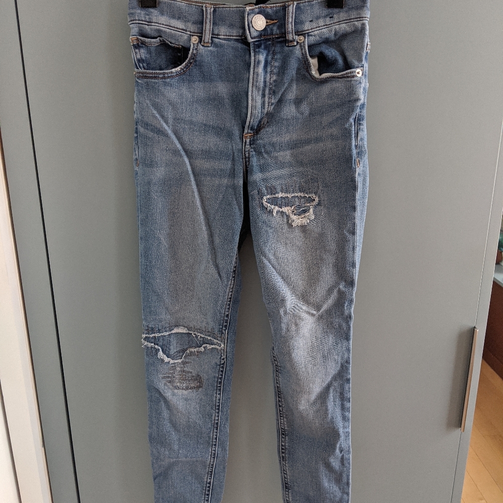 High-waisted patched jeans